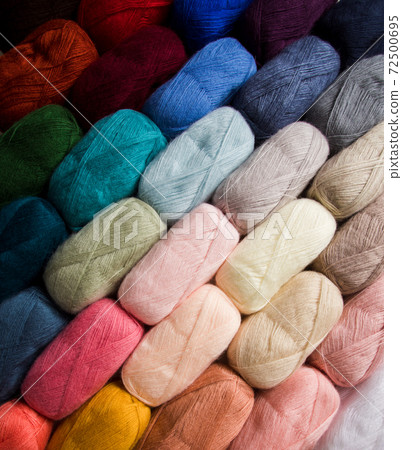 The bright threads for yarn are folded diagonally The bright threads for yarn are folded diagonally 72500695