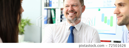 Cheerful business colleagues working in modern office 72501626