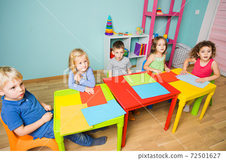 Little girls and boys are preparing to art lesson Little girls and boys are preparing to art lesson 72501627