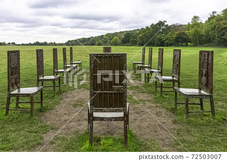 12 bronze chairs - Jurors artwork by Hew Locke in Runnymede, Surrey, United Kingdom 72503007