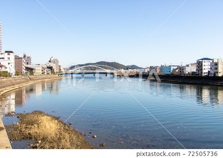 Scenery of Kagamigawa flowing through Kochi city. Scenery of Kagamigawa flowing through Kochi city. 72505736