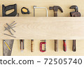 Top view variety of tools desk light brown wood   with copy space, Top angle many different tools for carpenter and building on wooden table with workplace, Technician repair concepts background. 72505740