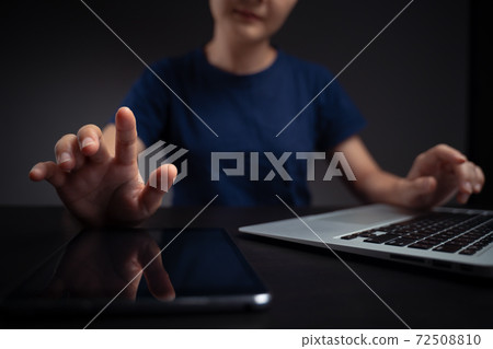 Hands and tablet working with laptop. Hands and tablet working with laptop. 72508810