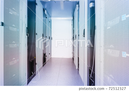 Server room with a row of server racks Server room with a row of server racks 72512327