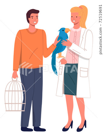 Veterinary care, veterinarian woman looking at blue parrot sitting at hand, checking health Veterinary care, veterinarian woman looking at blue parrot sitting at hand, checking health 72519691