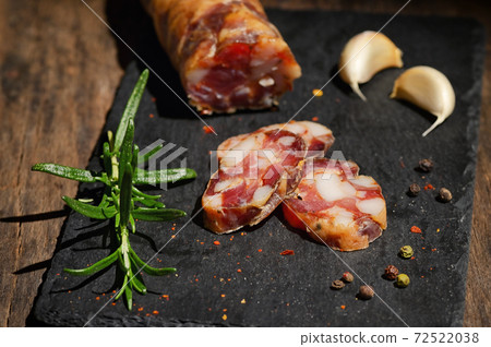 Slices Of Salami On A Ardesia Board 72522038