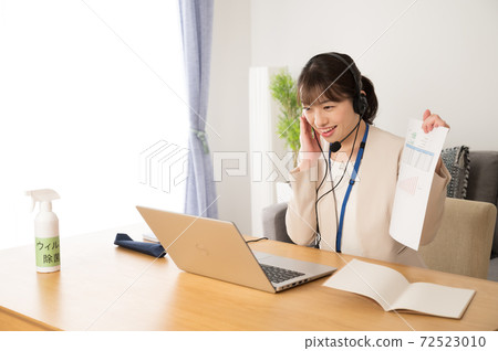 Woman working online sales Woman working online sales 72523010