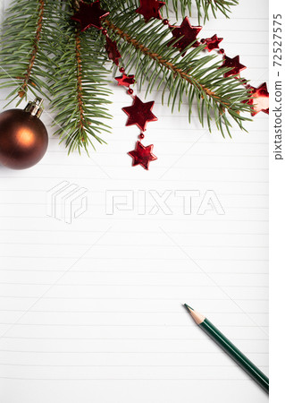 empty notebook page and fir branch New Year goals empty notebook page and fir branch New Year goals 72527575