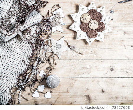 top view of beige and green Christmas decorations cozy home hygge 72527668