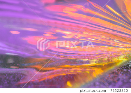 Abstract iridescent lilac yellow fluid reflections background Abstract iridescent lilac yellow fluid reflections background 72528820