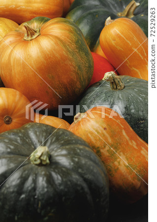 Many multicolor pumpkins, autumn seasonal decorative background 72529263