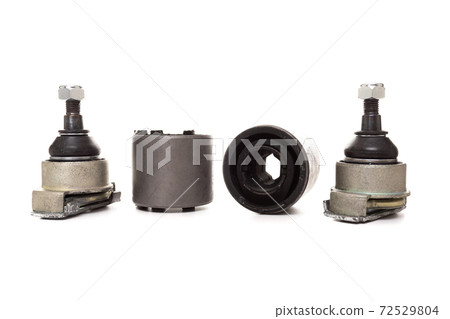 silent blocks and ball joints on a white background, the concept of an automobile suspension 72529804
