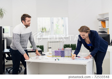 Executive Giving A Presentation To Her Office Coworkers Executive Giving A Presentation To Her Office Coworkers 72533548