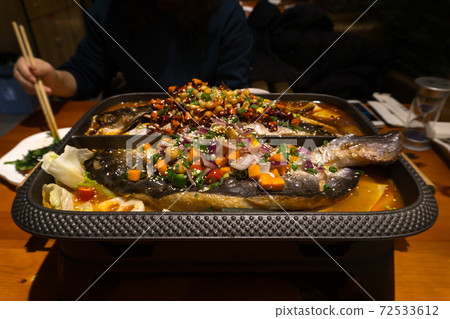 Chinese food brittle skin grilled fish 72533612
