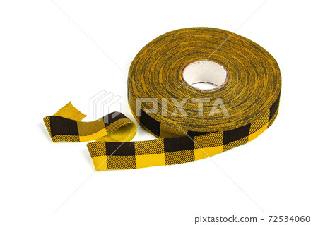 elastic knitted tape yarn for crochet on white background rolled up. elastic knitted tape yarn for crochet on white background rolled up. 72534060