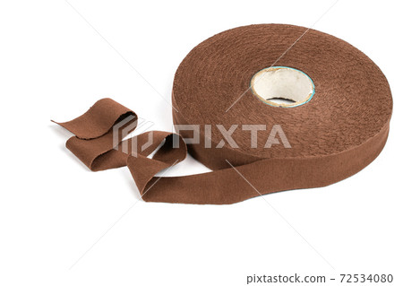 elastic knitted tape yarn for crochet on white background rolled up. elastic knitted tape yarn for crochet on white background rolled up. 72534080