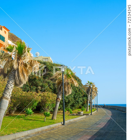 Couple empty promanade Madeira island 72534345