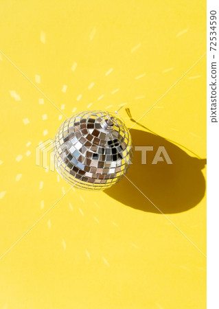 Disco balls on blue background 72534590