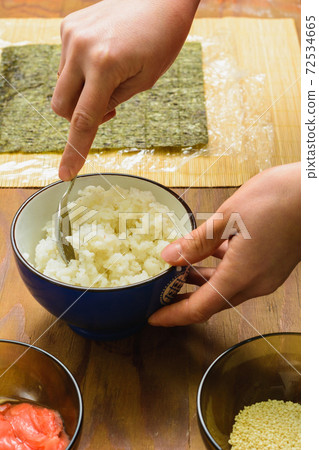 The process of preparing sushi from rice and additional ingredients at home The process of preparing sushi from rice and additional ingredients at home 72534665