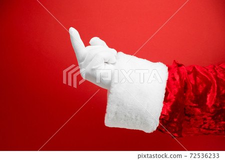Fucking 2020 year. The concept of a bad new year or christmas. Harsh emotion painted on the middle finger of Santa hand 72536233