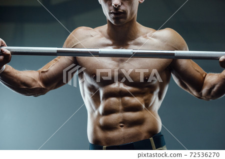 Fitness athletic man workout muscles exercise Fitness athletic man workout muscles exercise 72536270