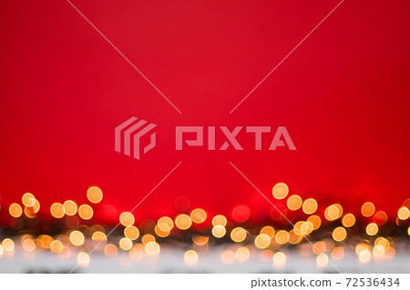 Abstract blurred bokeh lights on red background. Christmas and new year holidays light Abstract blurred bokeh lights on red background. Christmas and new year holidays light 72536434