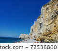 Summer beach in Etretat, France 72536800