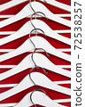 White hangers on a red background. Sales clothes concept. 72538257