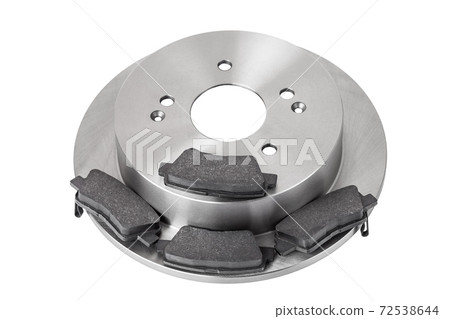 set of brake pads and brake disc new car spare parts brakes for a vehicle close up view isolated on a white background, nobody. set of brake pads and brake disc new car spare parts brakes for a vehicle close up view isolated on a white background, nobody. 72538644