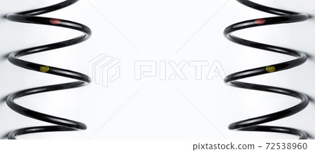 black coil spring made of durable steel for car suspension close-up replaceable spare part of frame with copy space on white background, nobody. black coil spring made of durable steel for car suspension close-up replaceable spare part of frame with copy space on white background, nobody. 72538960