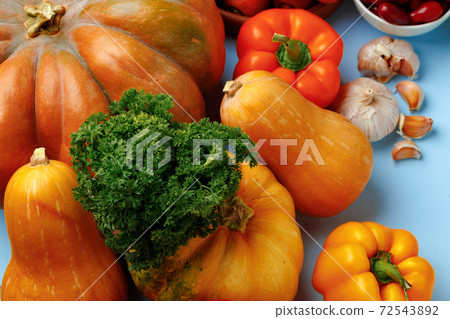 Beautiful assortment of colorful vegetables on blue background 72543892
