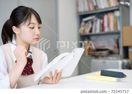 School girls studying School girls studying 72545717