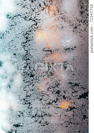Frozen snow on the window 72547758
