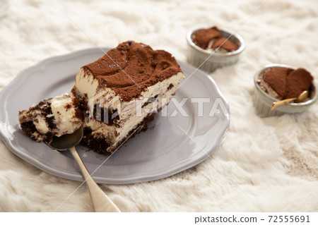 Tiramisu with mascarpone cheese with plenty of cocoa powder 72555691