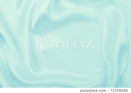 Smooth elegant blue silk or satin luxury cloth texture as abstract background. Luxurious background design Smooth elegant blue silk or satin luxury cloth texture as abstract background. Luxurious background design 72556096