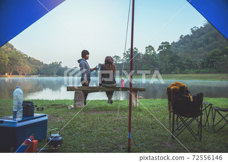 Travel camping by lake. Campers are on their camp at Namtok Sam Lan National Park (waterfall)  Saraburi, in Thailand. 72556146