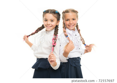 Braiding hair. Adorable little girls with plaited hair isolated  72557697
