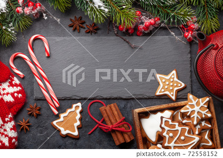 Christmas card with gingerbread cookies and tea Christmas card with gingerbread cookies and tea 72558152