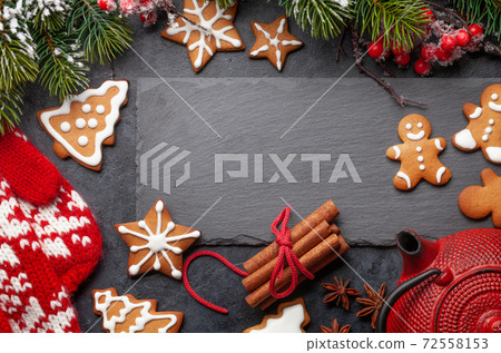 Christmas card with gingerbread cookies and tea Christmas card with gingerbread cookies and tea 72558153
