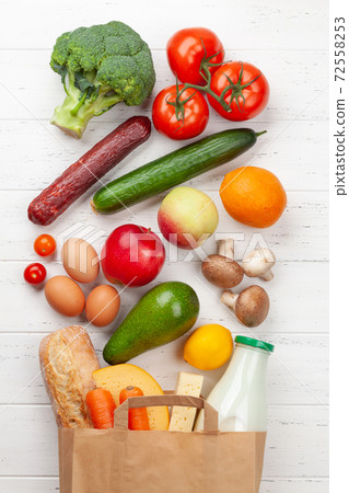 Different food in recycling paper bag 72558253