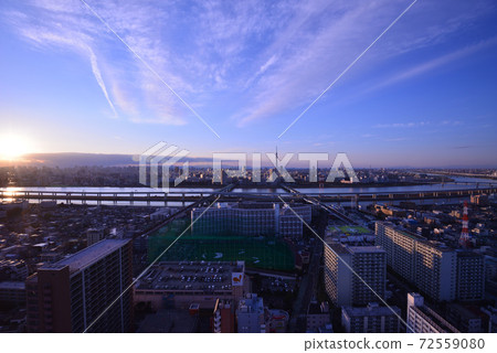 Evening view of Arakawa and central Tokyo as seen from Tower Hall Funabori 72559080