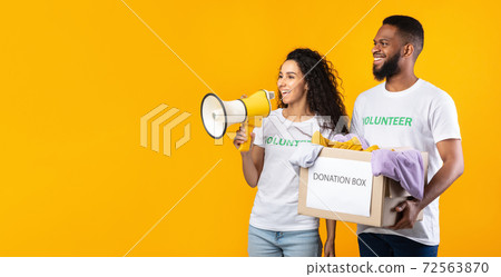 Two Diverse Volunteers Holding Donation Box, Studio Shot, Panorama 72563870
