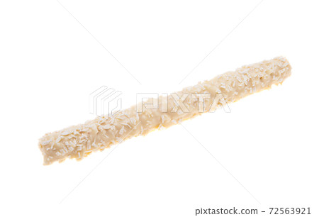wafer rolls with coconut flakes isolated 72563921