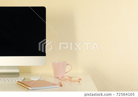 Concept of workplace with modern desktop computer on white table Concept of workplace with modern desktop computer on white table 72564105