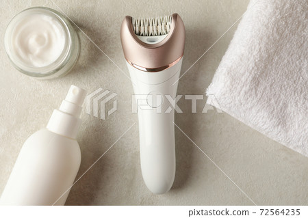 Concept of skincare with epilator on white table 72564235