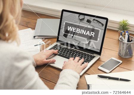 Woman having webinar at office, hands on keyboard close up 72564644