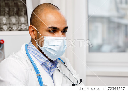 Portrait of african american doctor in medical... - Stock Photo ...