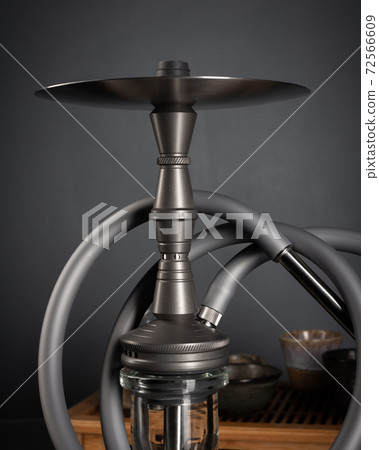 part of the hookah, modern design, on a background. part of the hookah, modern design, on a background. 72566609