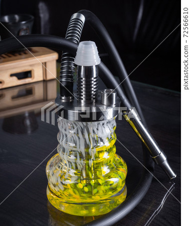 part of the hookah, modern design, on a background. part of the hookah, modern design, on a background. 72566610