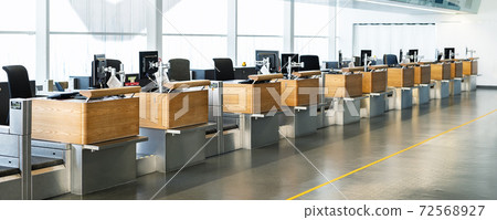 registration empty check-in counter desk closed due to covid pandemic lockdown, cancelled suspended flight. Airways and travel agency bankruptcy at coronavirus 72568927